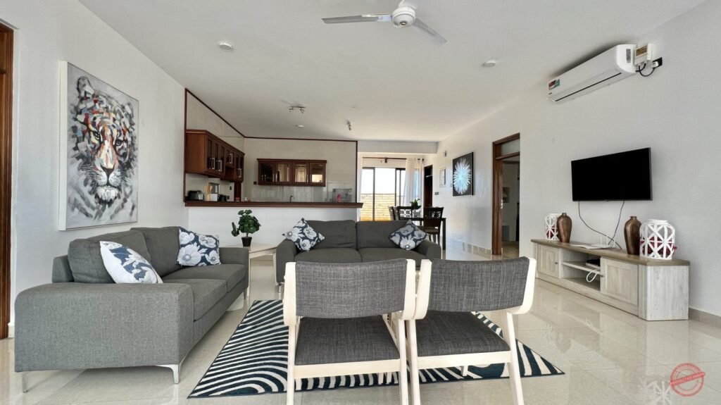 Furnished holiday home interior at the Kenyan coast: open-plan living room